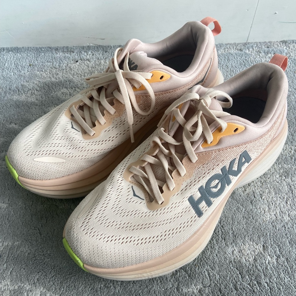 Hoka One One Bondi 8 Athletic Shoes in Cream and Orange